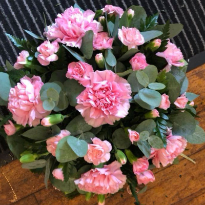 Pink Funeral Posy - A delicate pink posy designed for funerals, featuring a beautiful arrangement of soft pink blooms. Perfect for expressing sympathy and condolences.