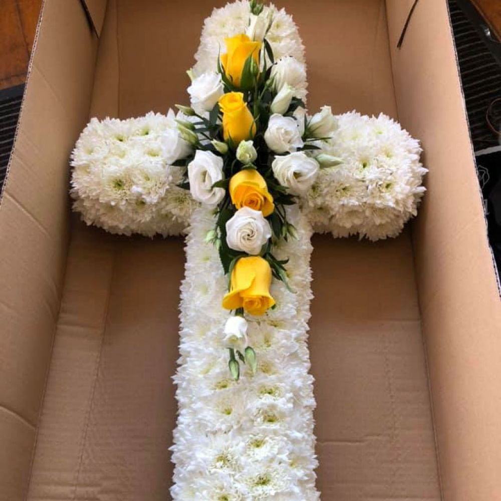 Yellow and white Cross