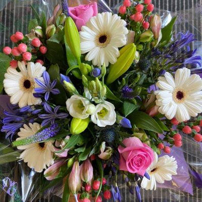 Mixed Joy Bouquet - A joyful mix of pink, purple, and white flowers, suitable for any occasion where a touch of beauty and elegance is desired.