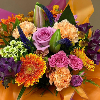 Vibrant Celebration Bouquet - A cheerful and vibrant bouquet with a mix of colourful flowers, perfect for celebrating any occasion.